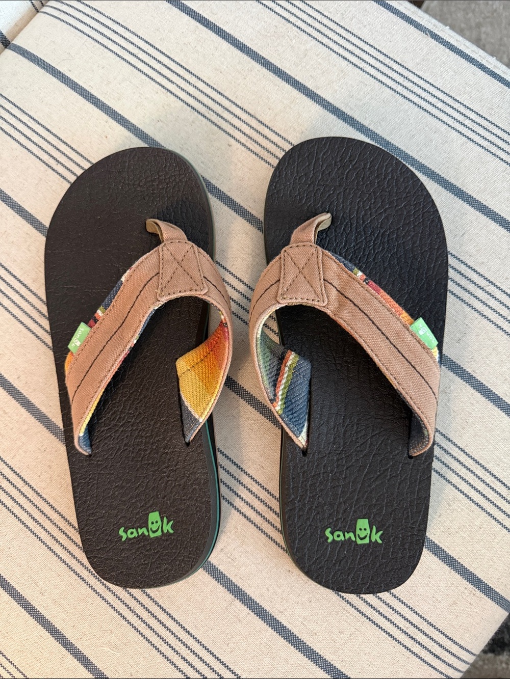 Sanuk Kids Black Flip Flops with Brown Straps and Multicolor Accents